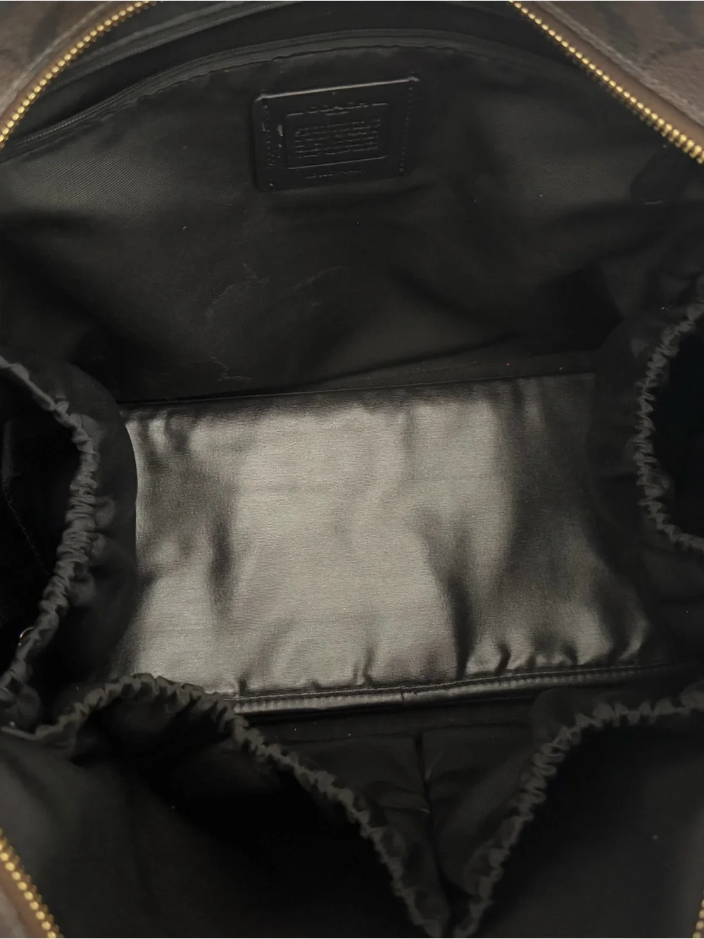 Coach Signature Diaper bag in Brown and Black